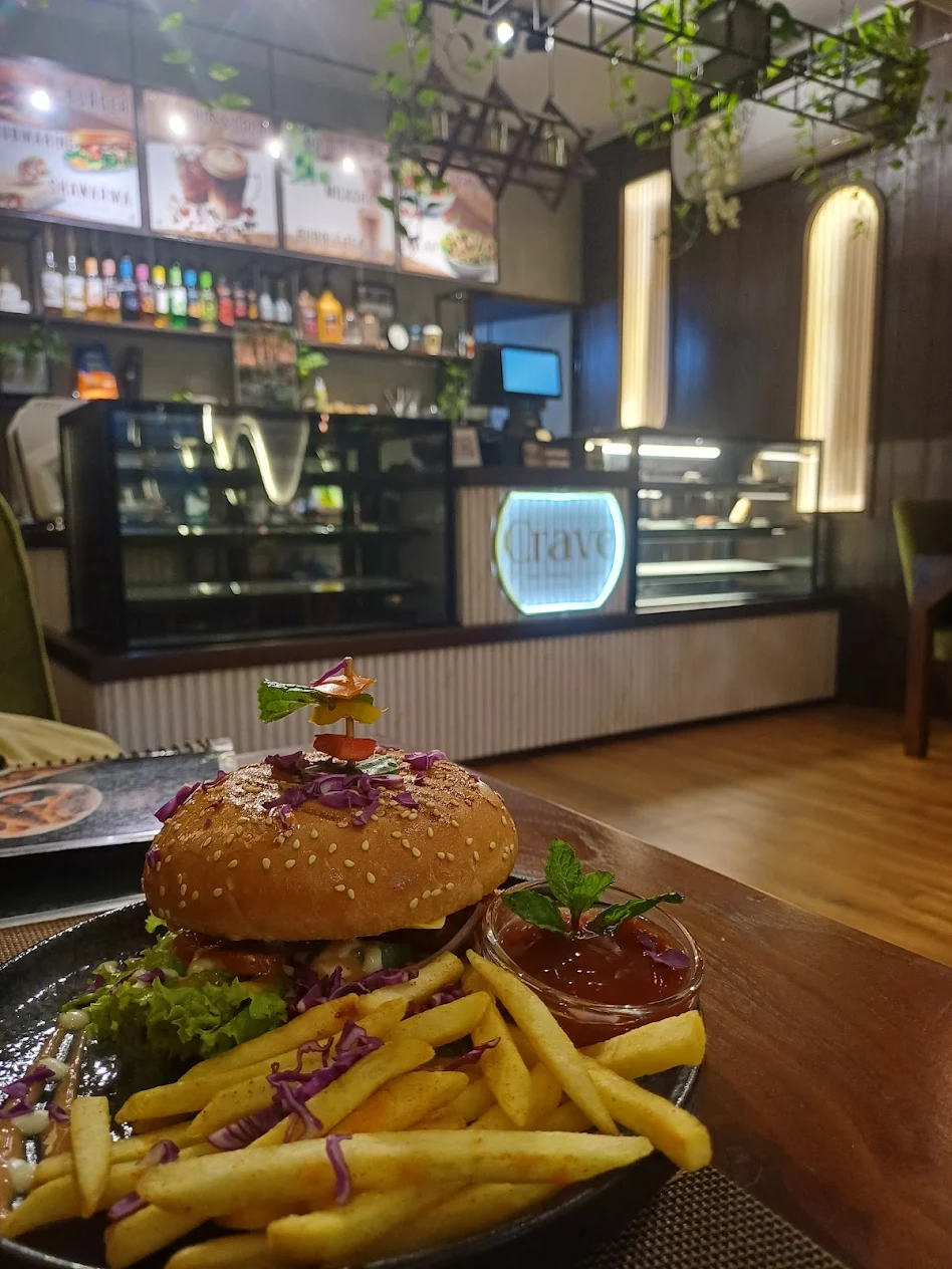 Burger with café backdrop